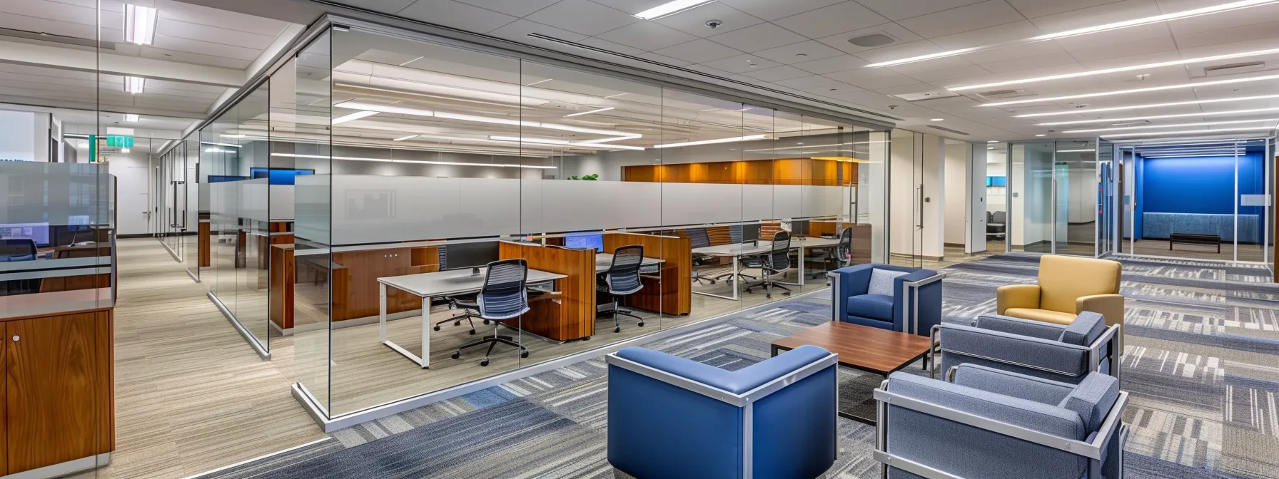 a sleek, modern office space with stylish acoustic room dividers in coordinating colors and custom designs, complemented by integrated lighting for a sound-optimized environment.